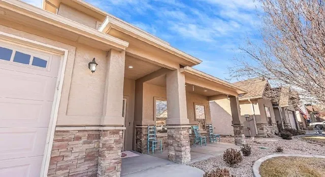 a view of living room filled with furniture and outdoor space
