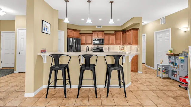 a view of a dining room with furniture