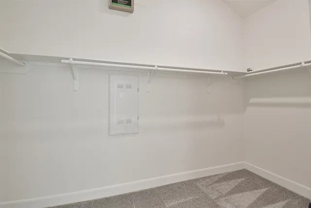 a view of an empty walk in closet