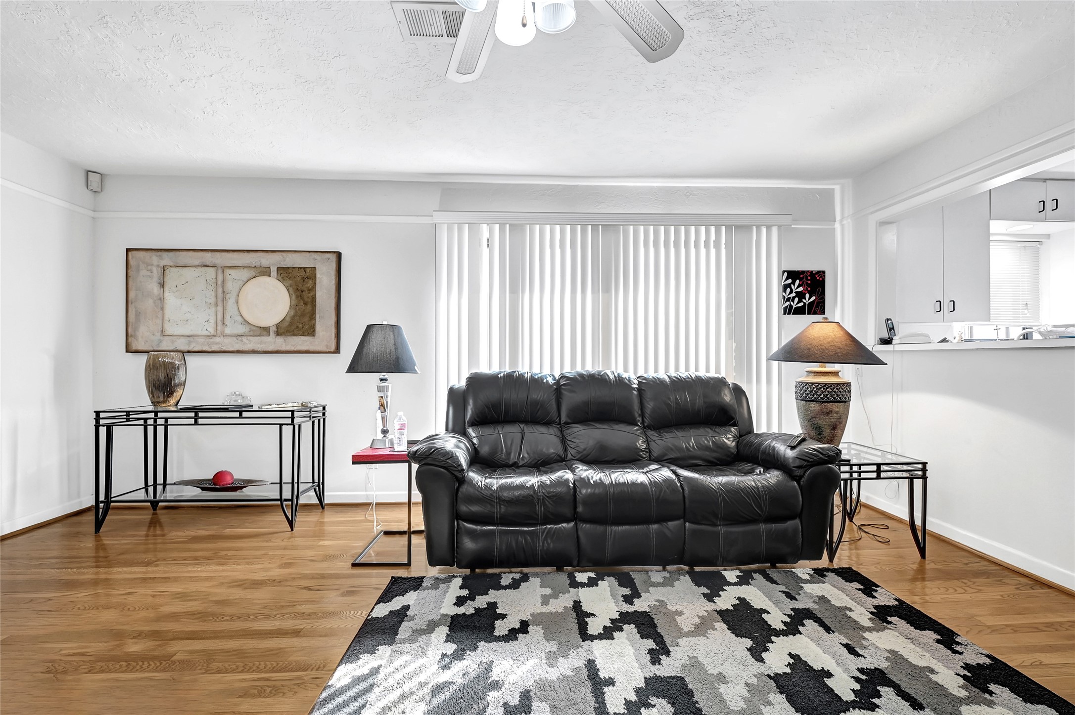 4831 Knickerbocker Street Houston, TX 77035 - Photo 22 of 50 Spacious main living room featuring a large sectional sofa, ideal for relaxing or entertaining guests.