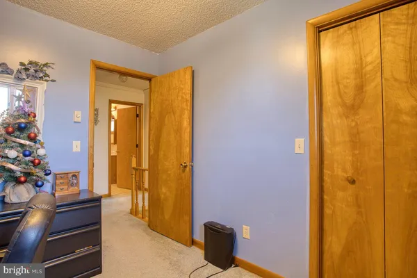 a bathroom with a bathtub and a window