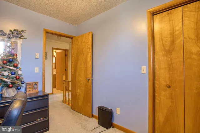 a bathroom with a bathtub and a window