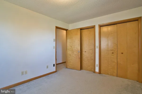 a en suite bathroom with a sink and mirror