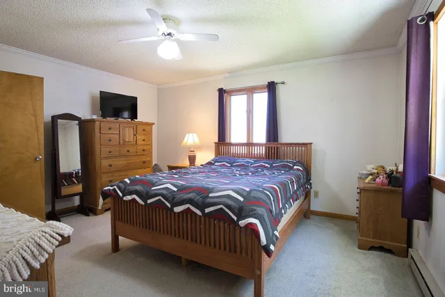 an aerial view of residential house with outdoor space