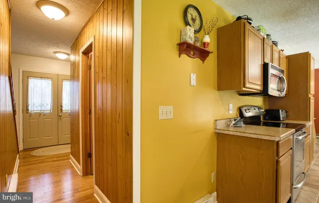 a view of living room with furniture and a window