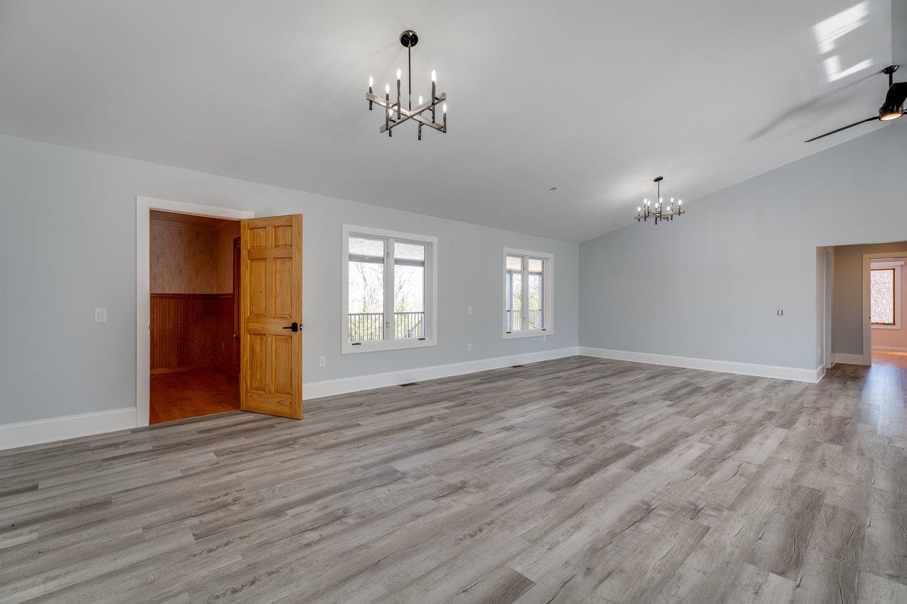 347 Enterprise Road Churchville, VA 24421 - Photo 12 of 75 a view of empty room with wooden floor and fan