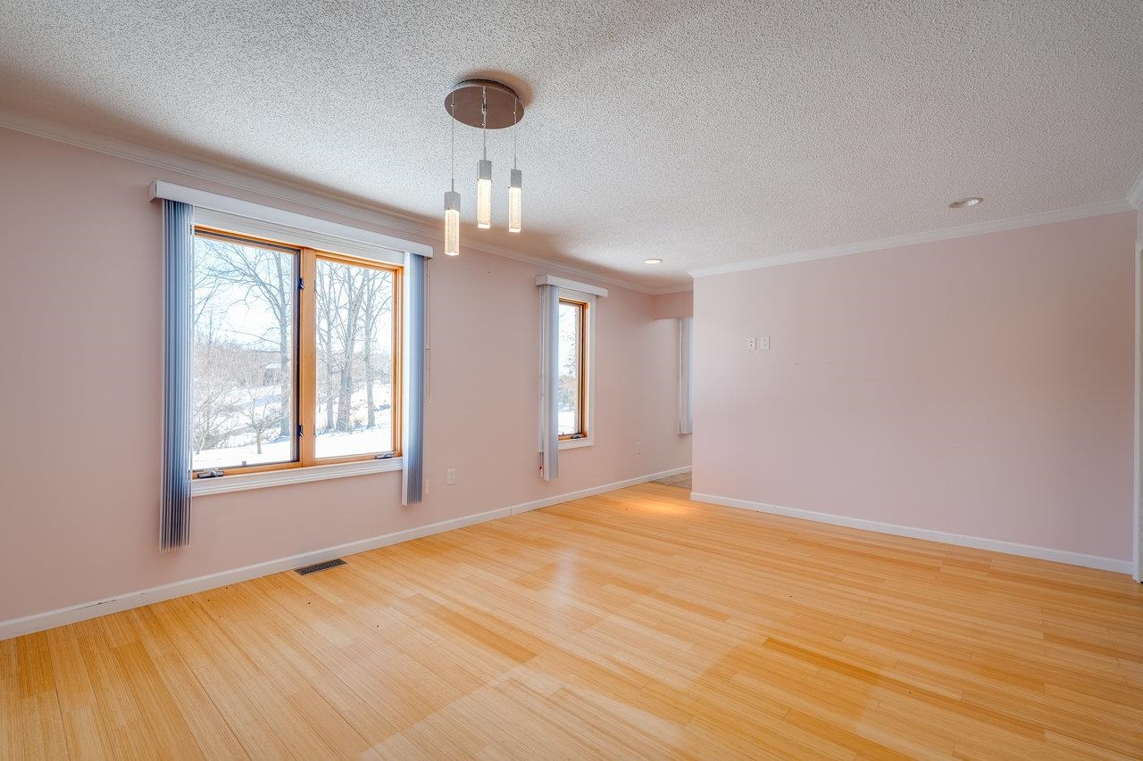347 Enterprise Road Churchville, VA 24421 - Photo 24 of 75 a view of an empty room with wooden floor and a window