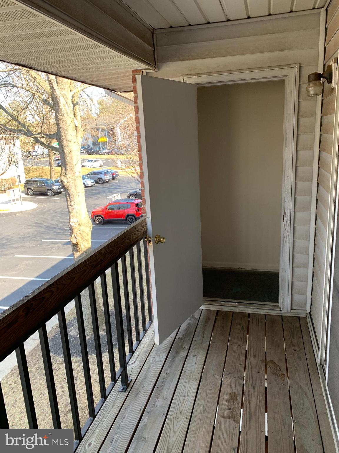 7 Lockhart Circle, Unit F Forest Hill, MD 21050 - Photo 9 of 11 a view of a balcony with wooden floor