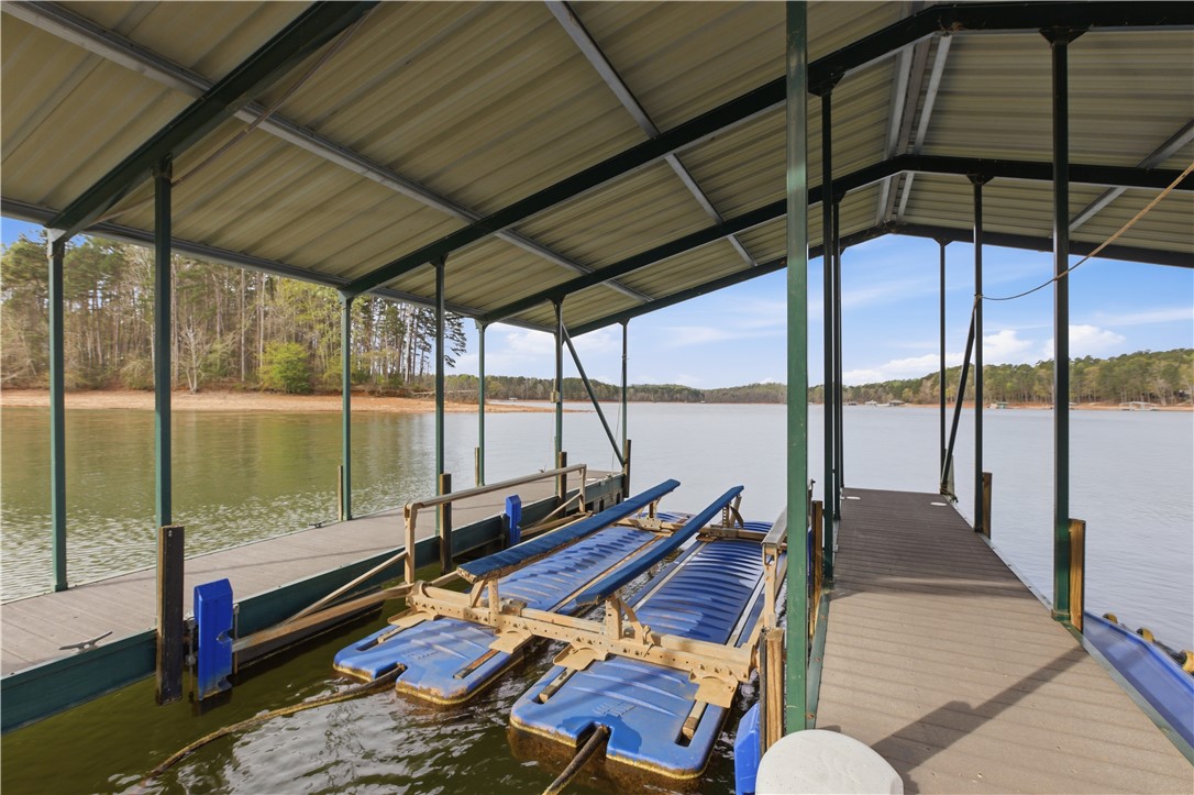 501 Capri Point Lavonia, GA 30553 - Photo 23 of 50 Boathouse with a serene lake view.