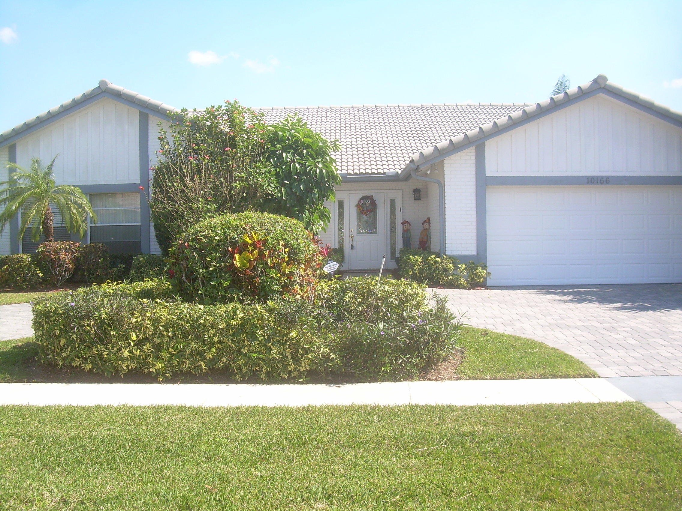 10166 Crosswind Road Boca Raton, FL 33498 - Photo 1 of 34 honeyc frt house 4 060