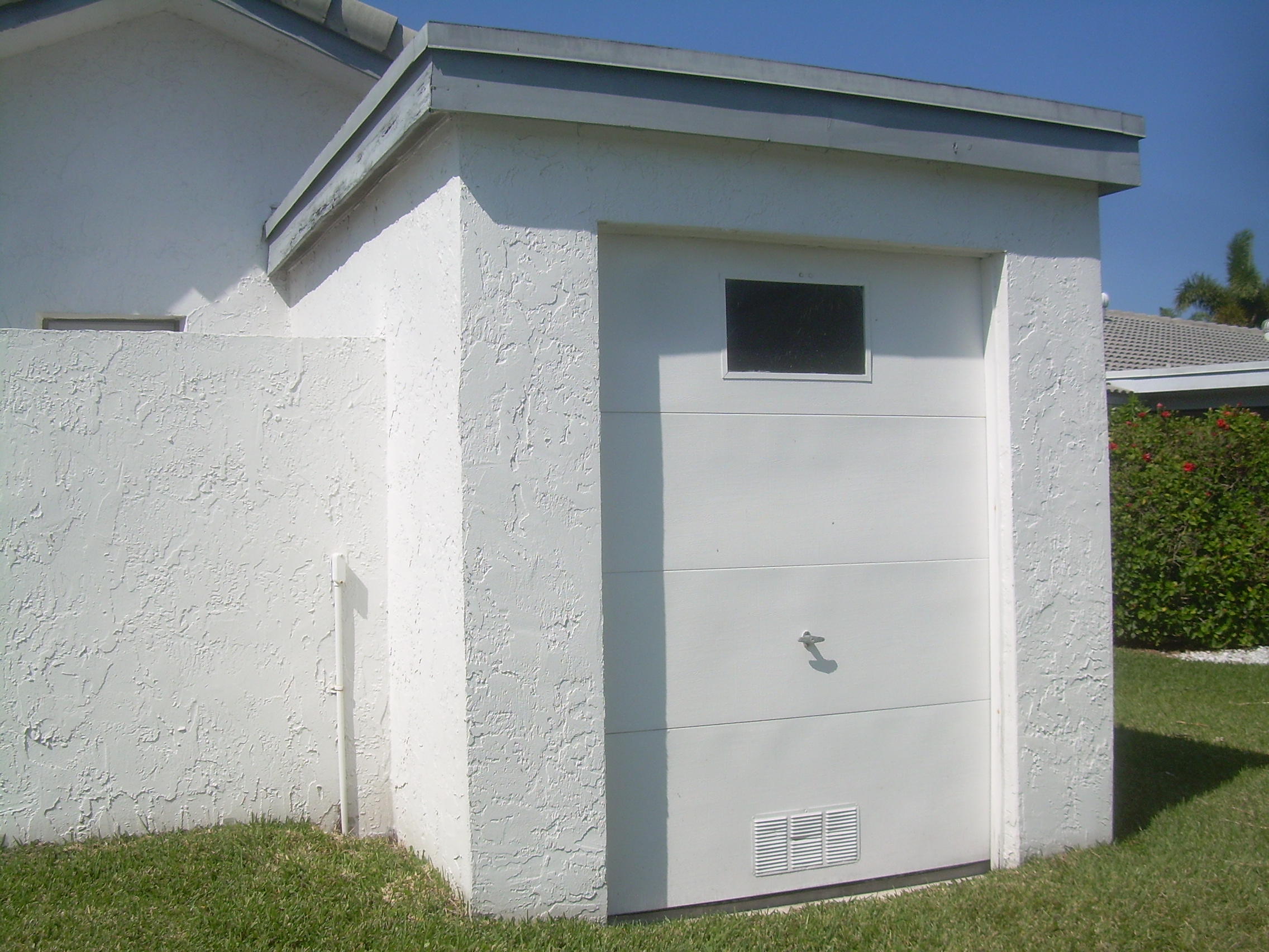 10166 Crosswind Road Boca Raton, FL 33498 - Photo 34 of 34 honeyc backyard garage 056