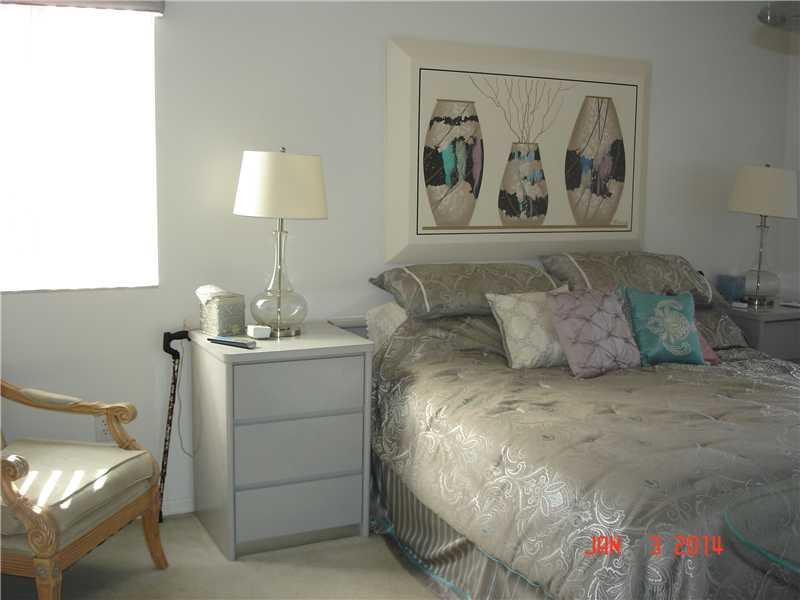2503 North Nob Hill Road, Unit 401 Sunrise, FL 33322 - Photo 8 of 22 Master Bedroom