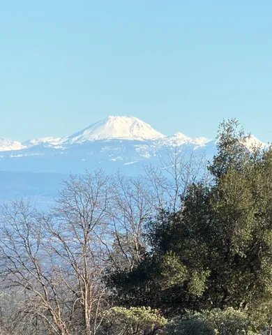 a view of a lake with a mountain in the background