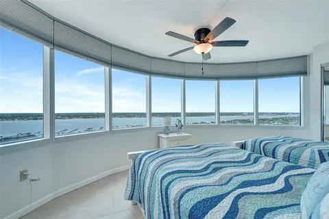 a bedroom with furniture and window