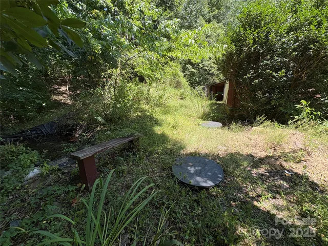a view of outdoor space and a yard