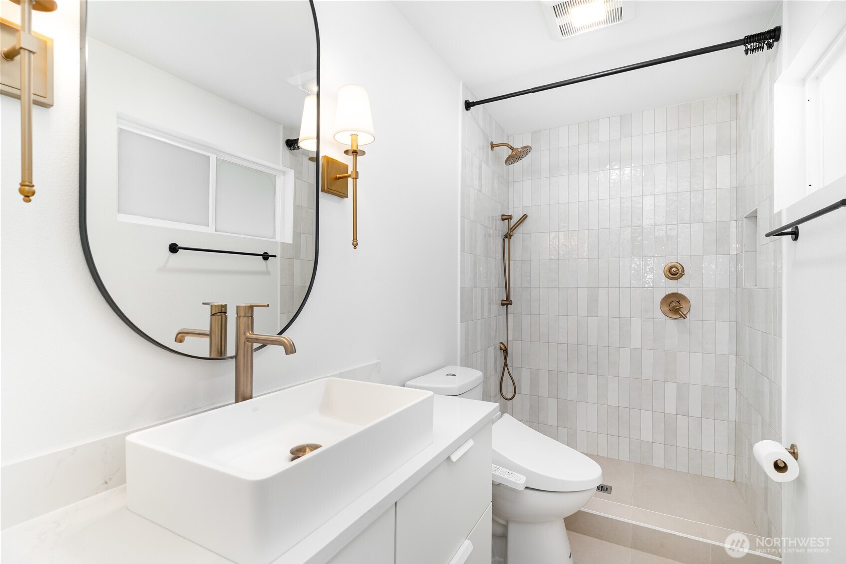 8428 Northeast 132nd Place Kirkland, WA 98034 - Photo 18 of 30 a bathroom with a sink a toilet and shower