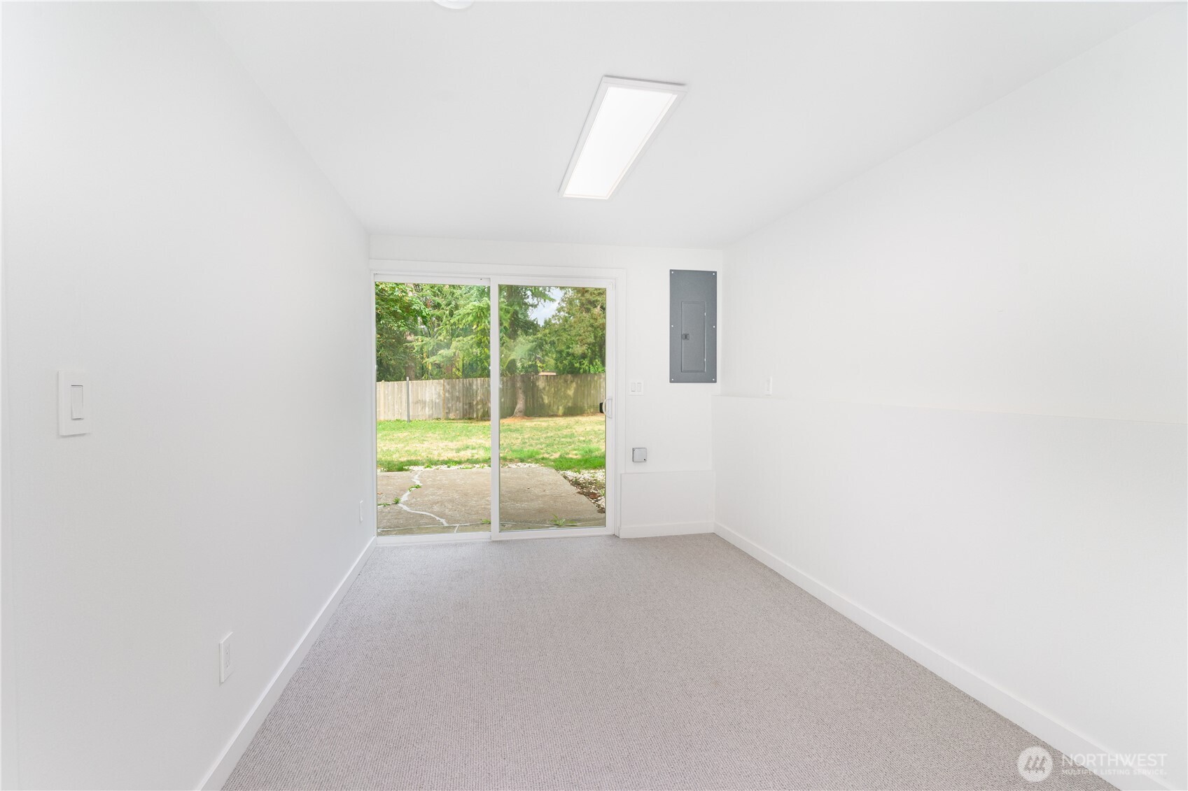 8428 Northeast 132nd Place Kirkland, WA 98034 - Photo 27 of 30 a view of an empty room with a window