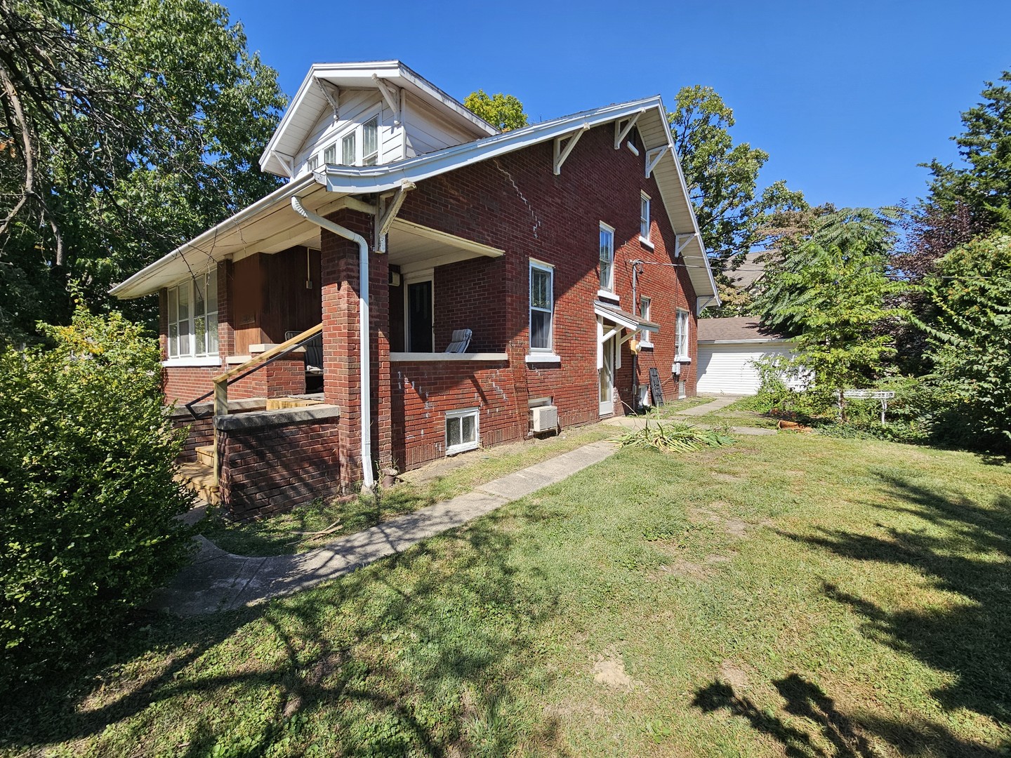 312 West Springfield Avenue Champaign, IL 61820 - Photo 2 of 5 a view of a house with a yard