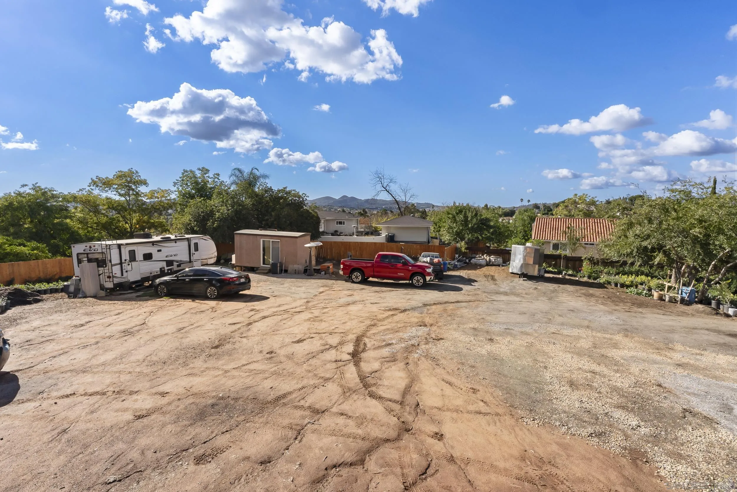 0 Park Hill Drive, Unit 24 Escondido, CA 92025 - Photo 26 of 28 a car parked on the side of a building