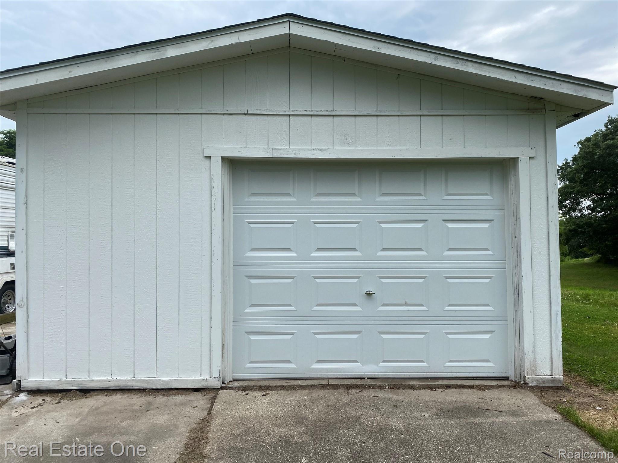 1465 Addis Road Holly, MI 48442 - Photo 14 of 16 Single car garage with a New Roof