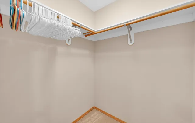 a view of a room with racks on the wall