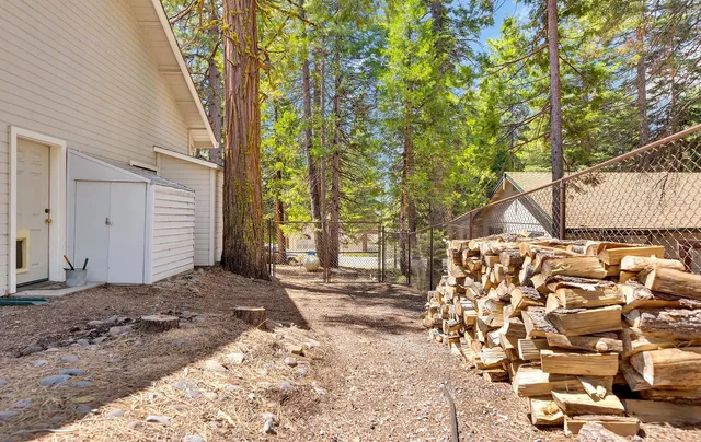 a backyard of a house with lots of green space