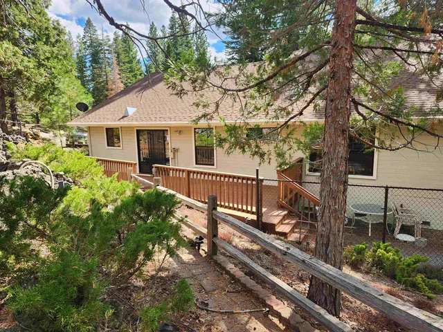 a house view with a garden space