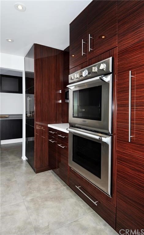 32732 Mediterranean Drive Dana Point, CA 92629 - Photo 11 of 24 a kitchen with a stove and a microwave