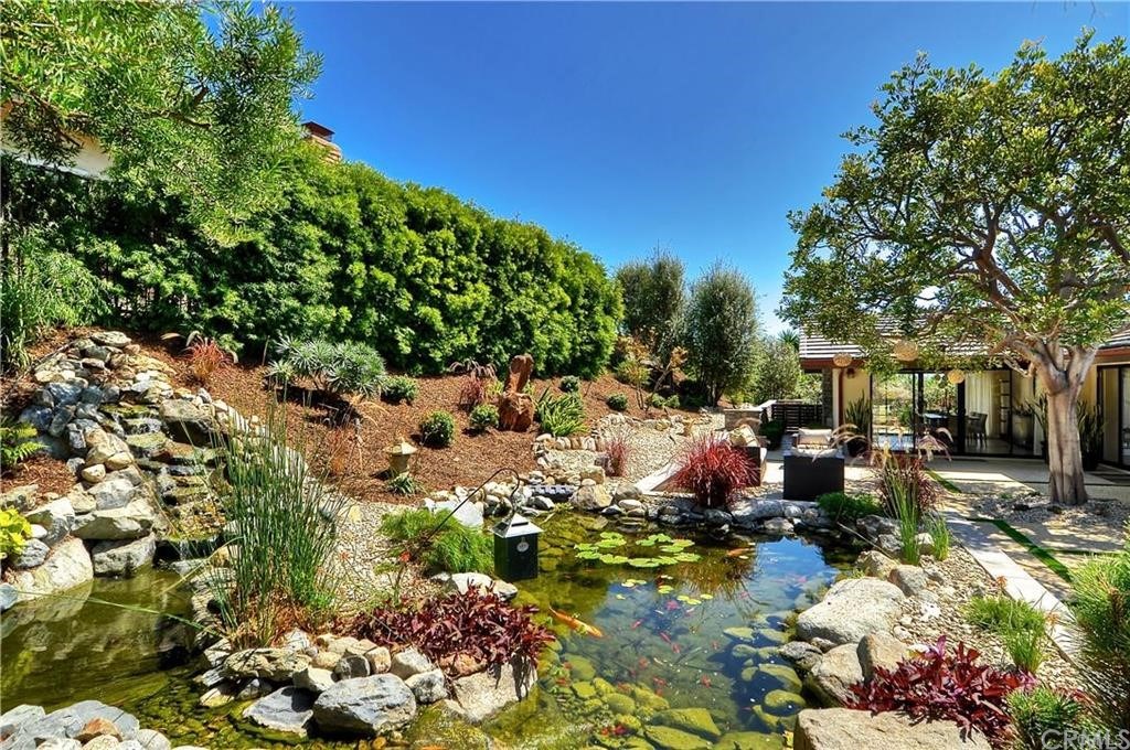 32732 Mediterranean Drive Dana Point, CA 92629 - Photo 12 of 24 a backyard of a house with a tree