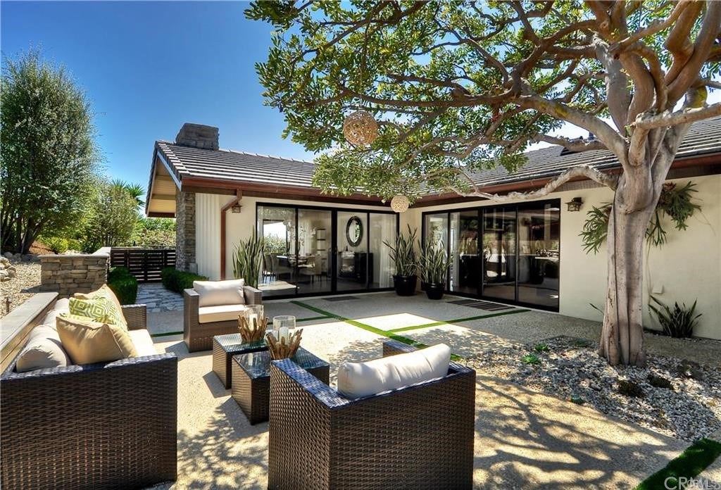 32732 Mediterranean Drive Dana Point, CA 92629 - Photo 22 of 24 a view of a house with backyard porch and sitting area