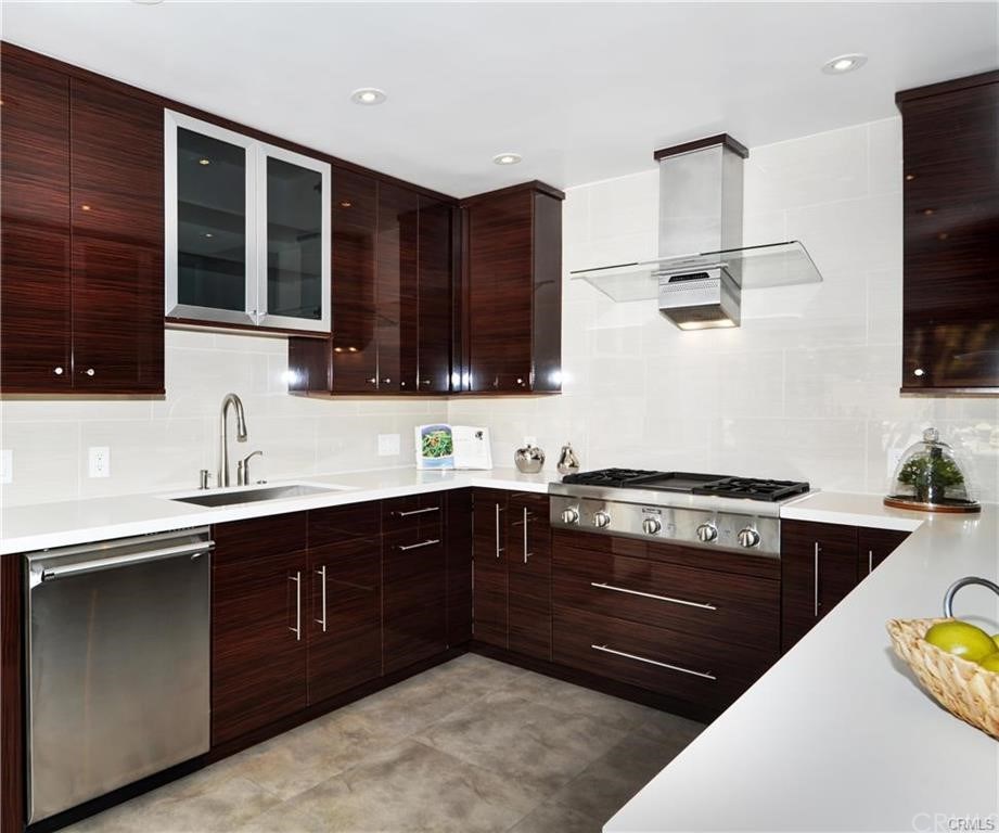 32732 Mediterranean Drive Dana Point, CA 92629 - Photo 10 of 24 a kitchen with a sink a stove and cabinets
