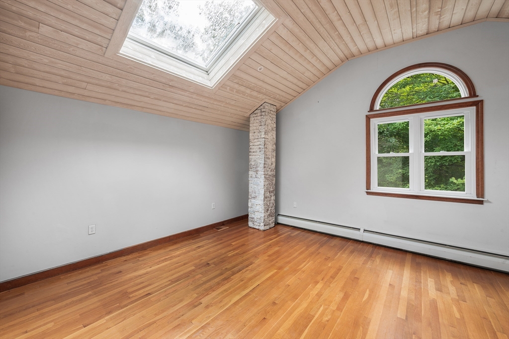 44 East Bare Hill Road Harvard, MA 01451 - Photo 15 of 20 an empty room with wooden floor windows and wooden floor