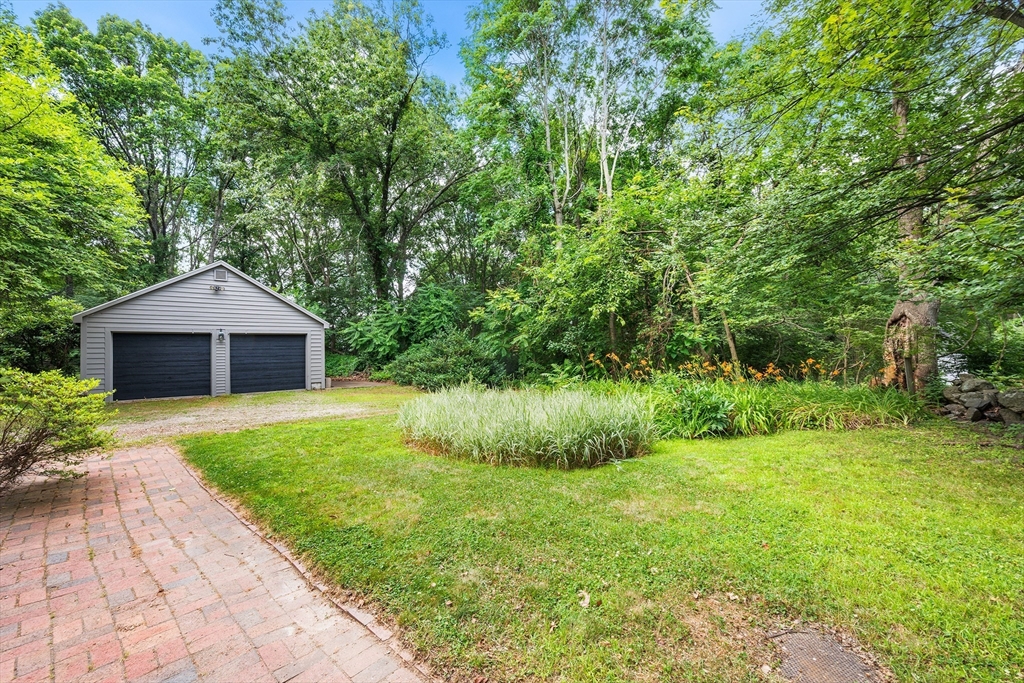 44 East Bare Hill Road Harvard, MA 01451 - Photo 3 of 20 a front view of a house with garden