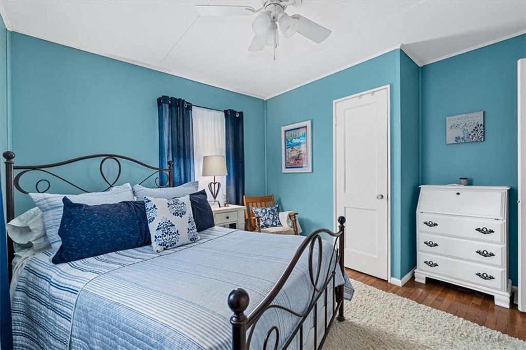 1038 Summit Avenue Monaca, PA 15061 - Photo 17 of 23 a bedroom with a bed and a dresser