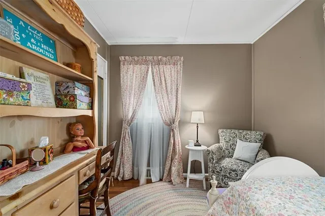 a bed room with a bed and a window