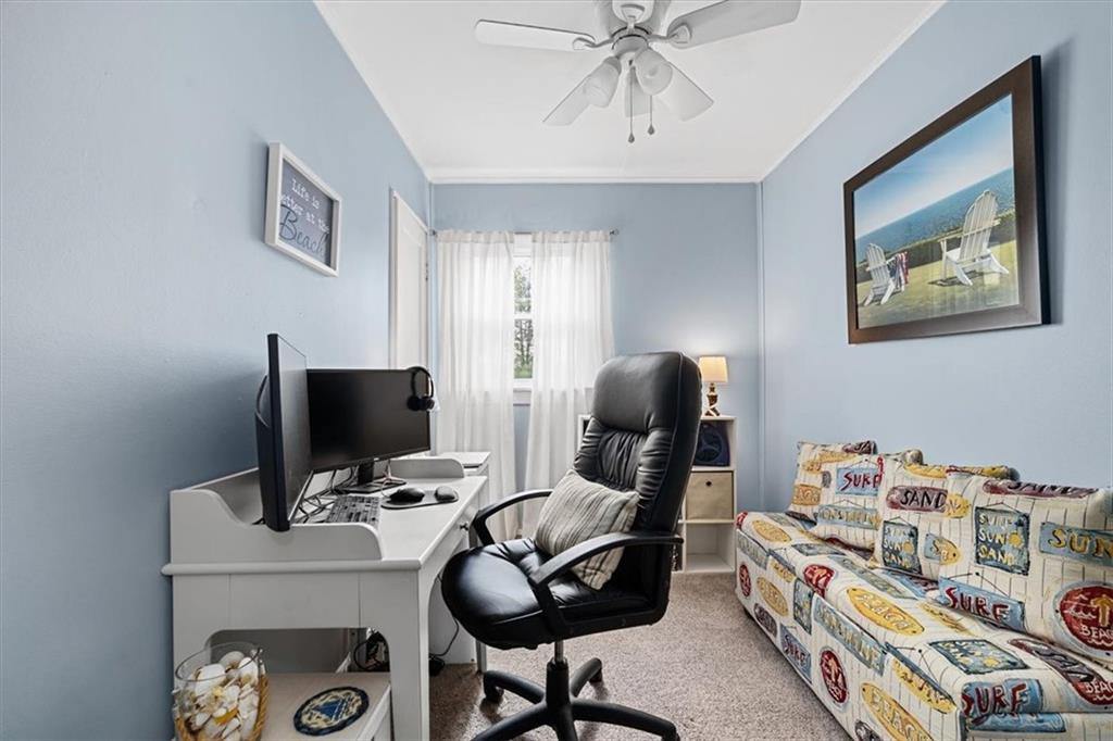 1038 Summit Avenue Monaca, PA 15061 - Photo 19 of 23 a view of a workspace with furniture and a ceiling fan