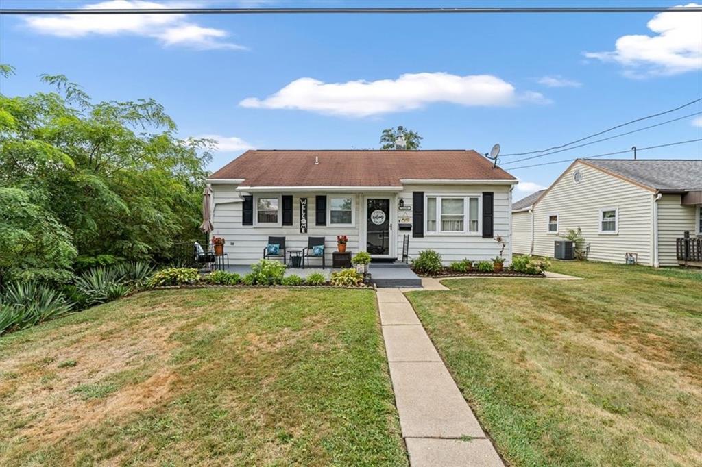 1038 Summit Avenue Monaca, PA 15061 - Photo 2 of 23 a view of a house with swimming pool and a yard