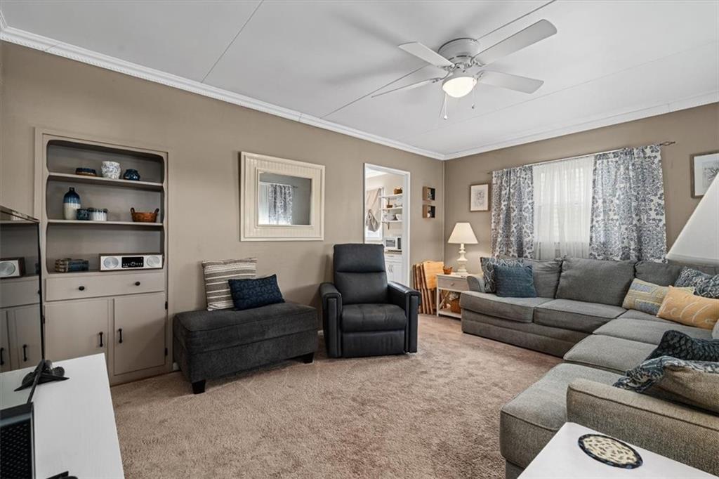 1038 Summit Avenue Monaca, PA 15061 - Photo 7 of 23 a living room with furniture and a window