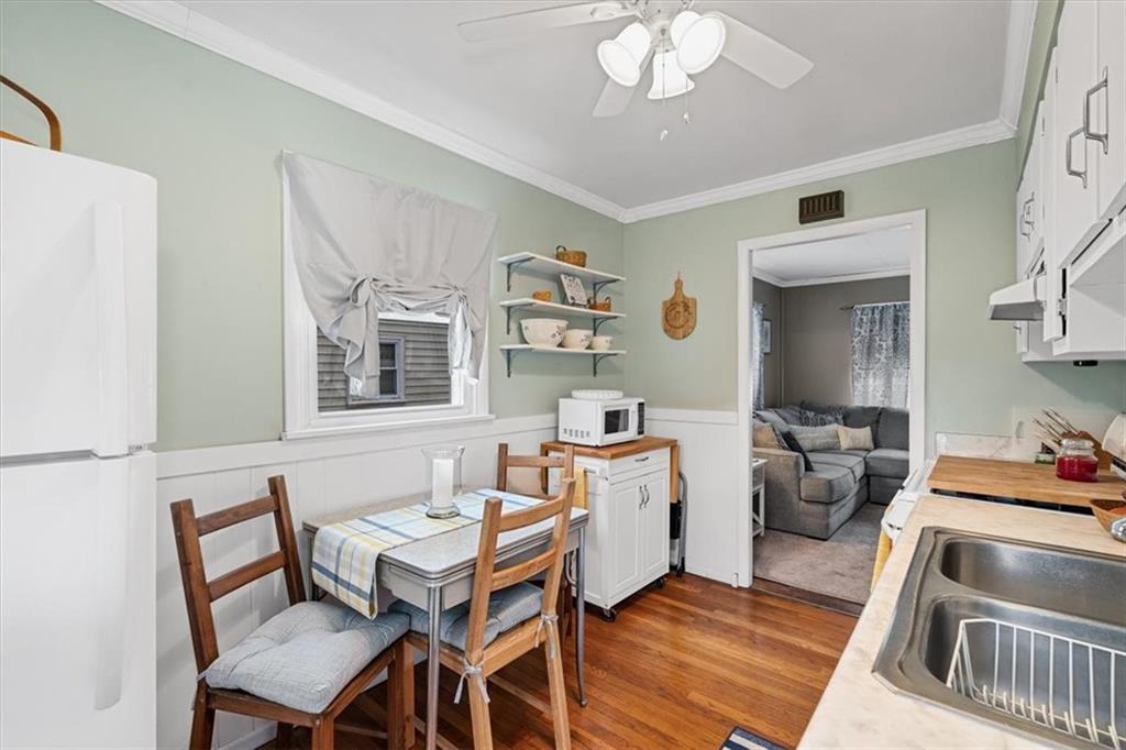 1038 Summit Avenue Monaca, PA 15061 - Photo 10 of 23 a living room with fireplace furniture and a wooden floor