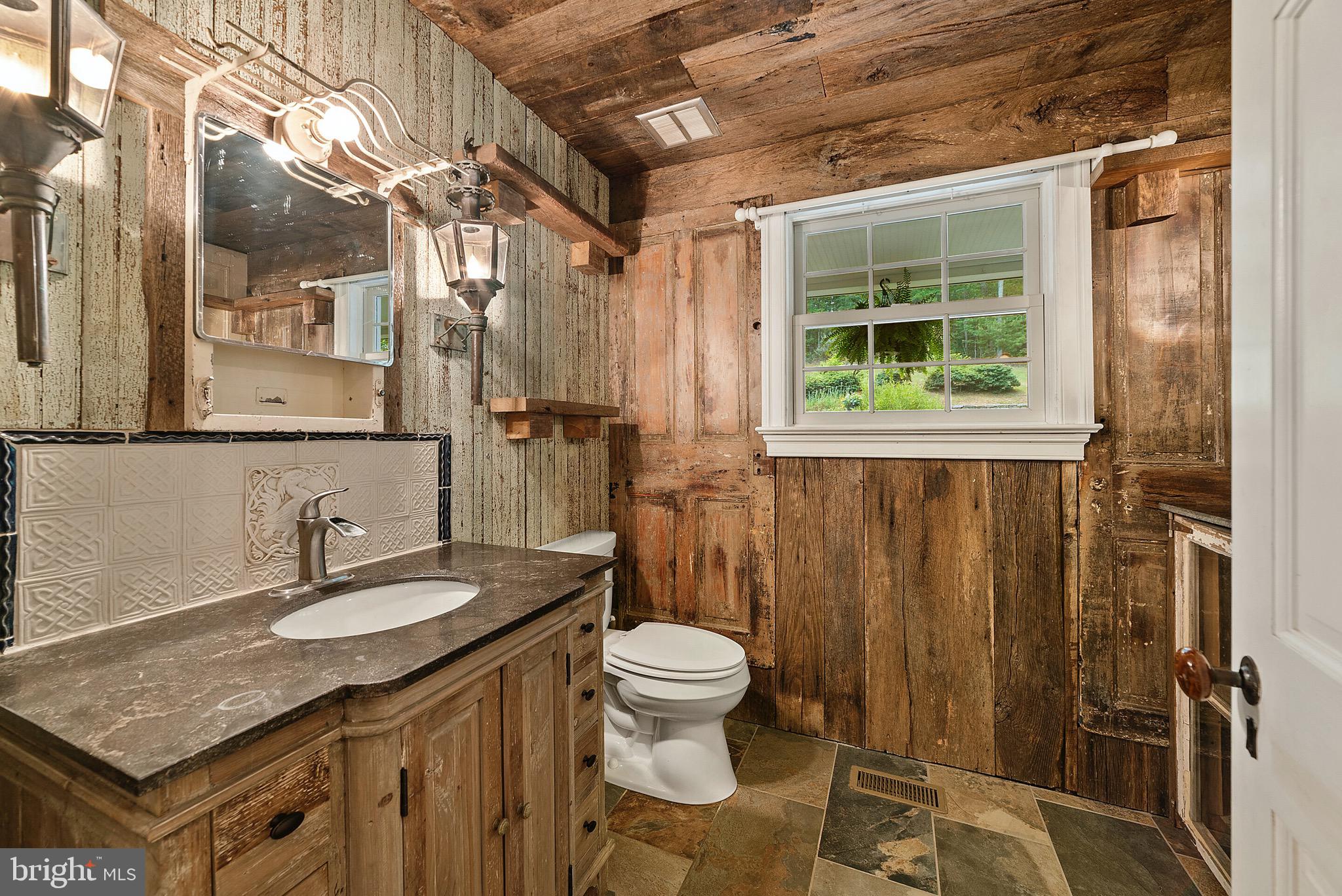 5588 Free State Road Marshall, VA 20115 - Photo 27 of 88 Walls are covered with antique wood and doors.