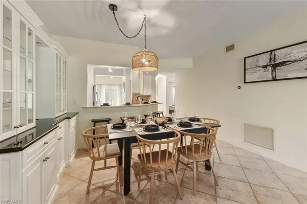 a kitchen with counter top space and appliances