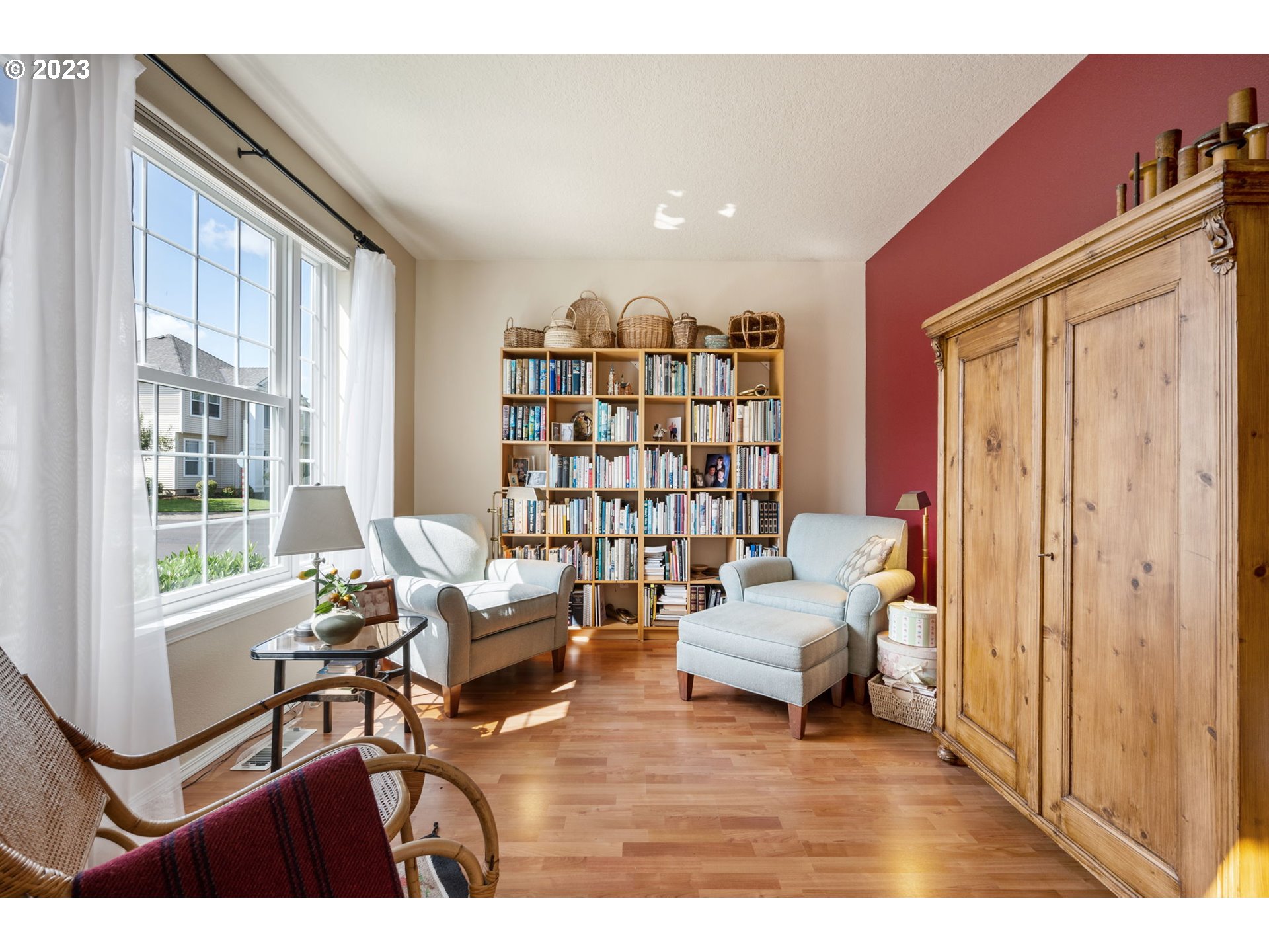 8627 Southwest Lodi Lane Portland, OR 97224 - Photo 14 of 41 a living room with furniture and a window