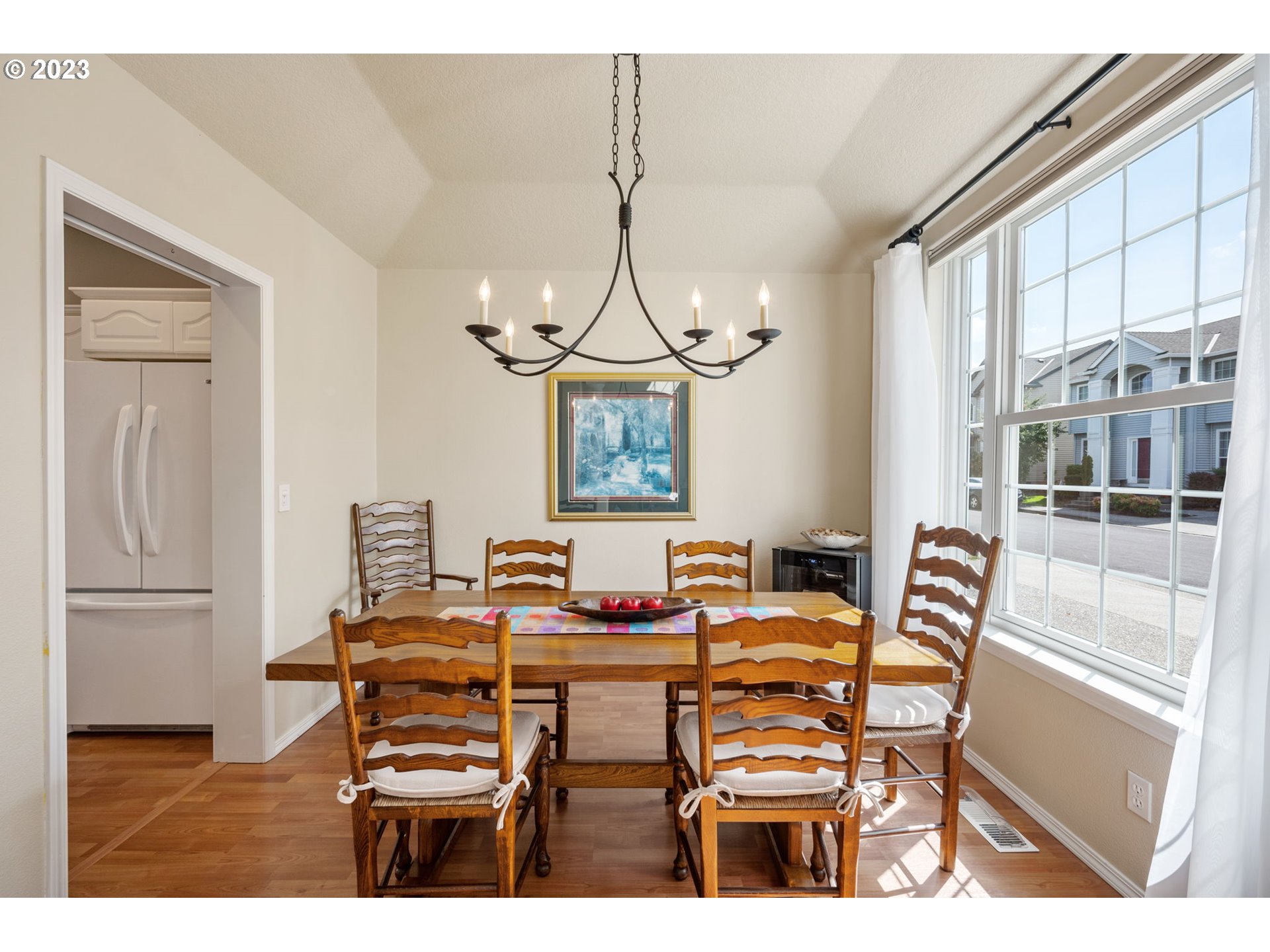8627 Southwest Lodi Lane Portland, OR 97224 - Photo 15 of 41 a dining room with furniture and window