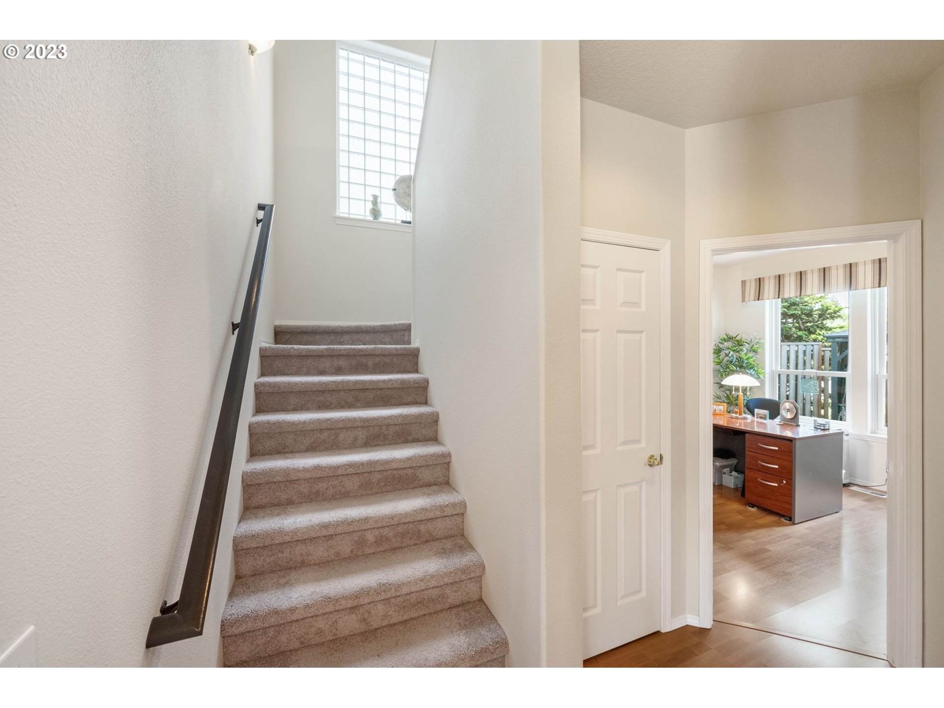 8627 Southwest Lodi Lane Portland, OR 97224 - Photo 18 of 41 a view of entryway and hall with wooden floor