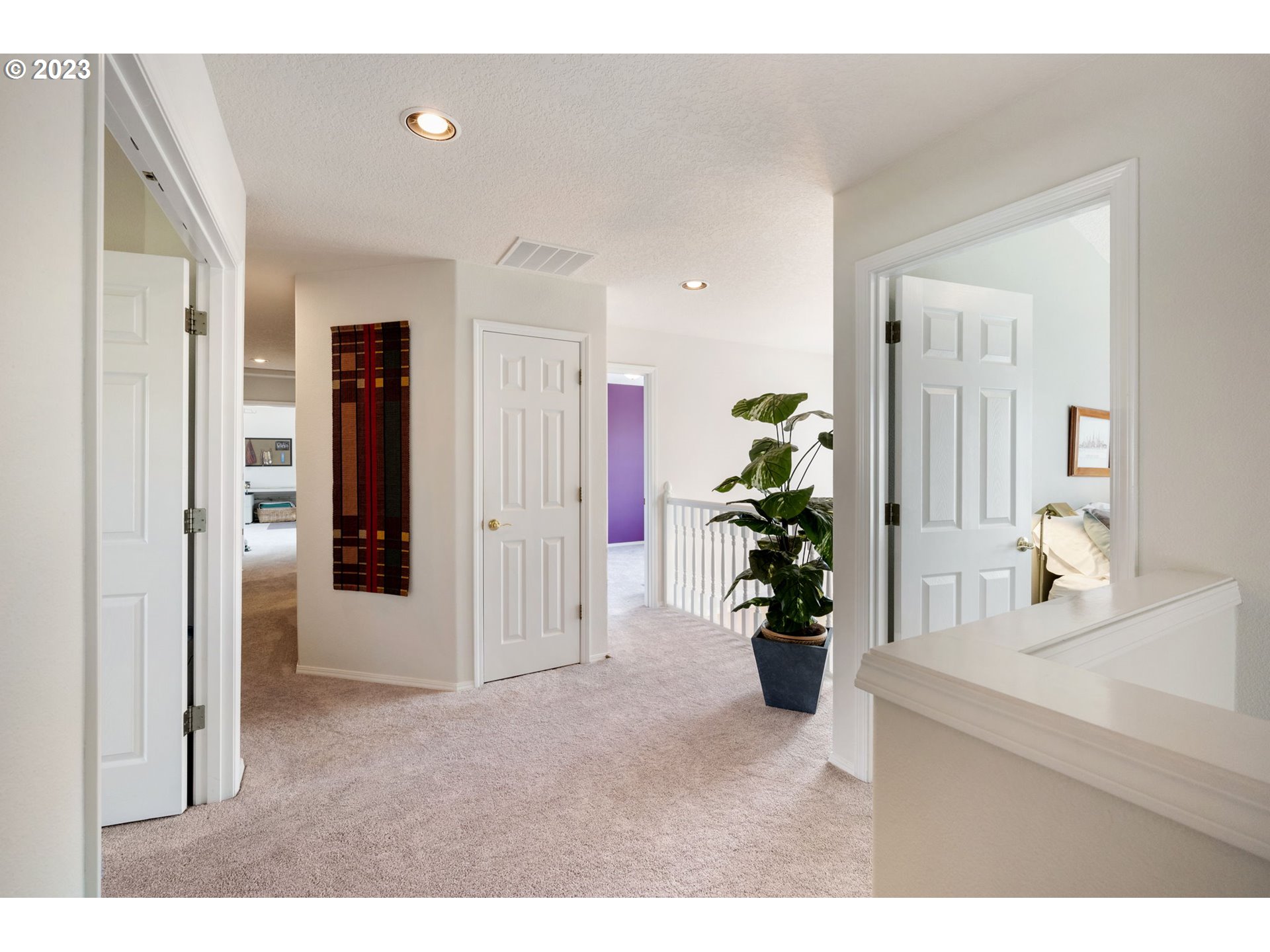 8627 Southwest Lodi Lane Portland, OR 97224 - Photo 19 of 41 a view interior of a house and an entryway with wooden floor