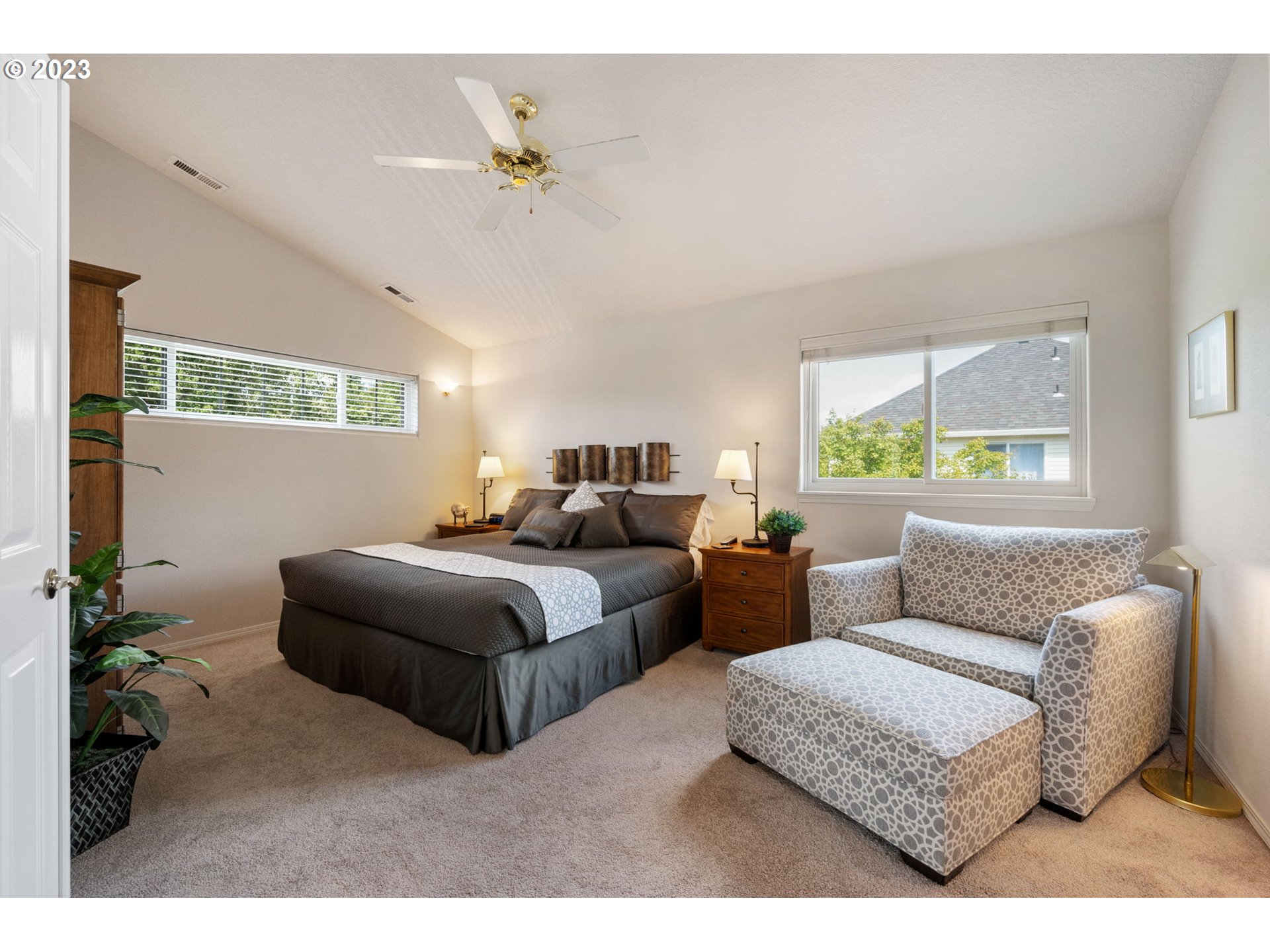 8627 Southwest Lodi Lane Portland, OR 97224 - Photo 20 of 41 a living room with furniture and a large window