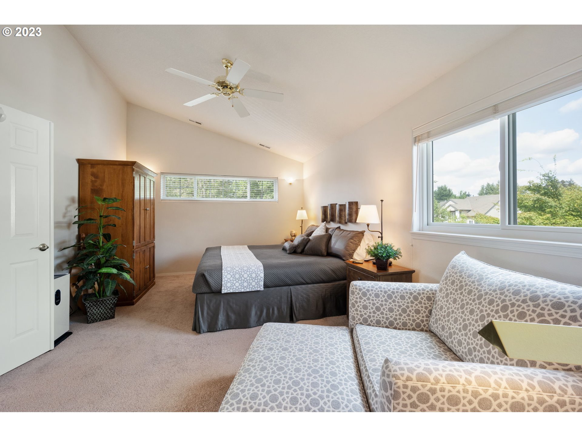 8627 Southwest Lodi Lane Portland, OR 97224 - Photo 21 of 41 a living room with furniture and a large window