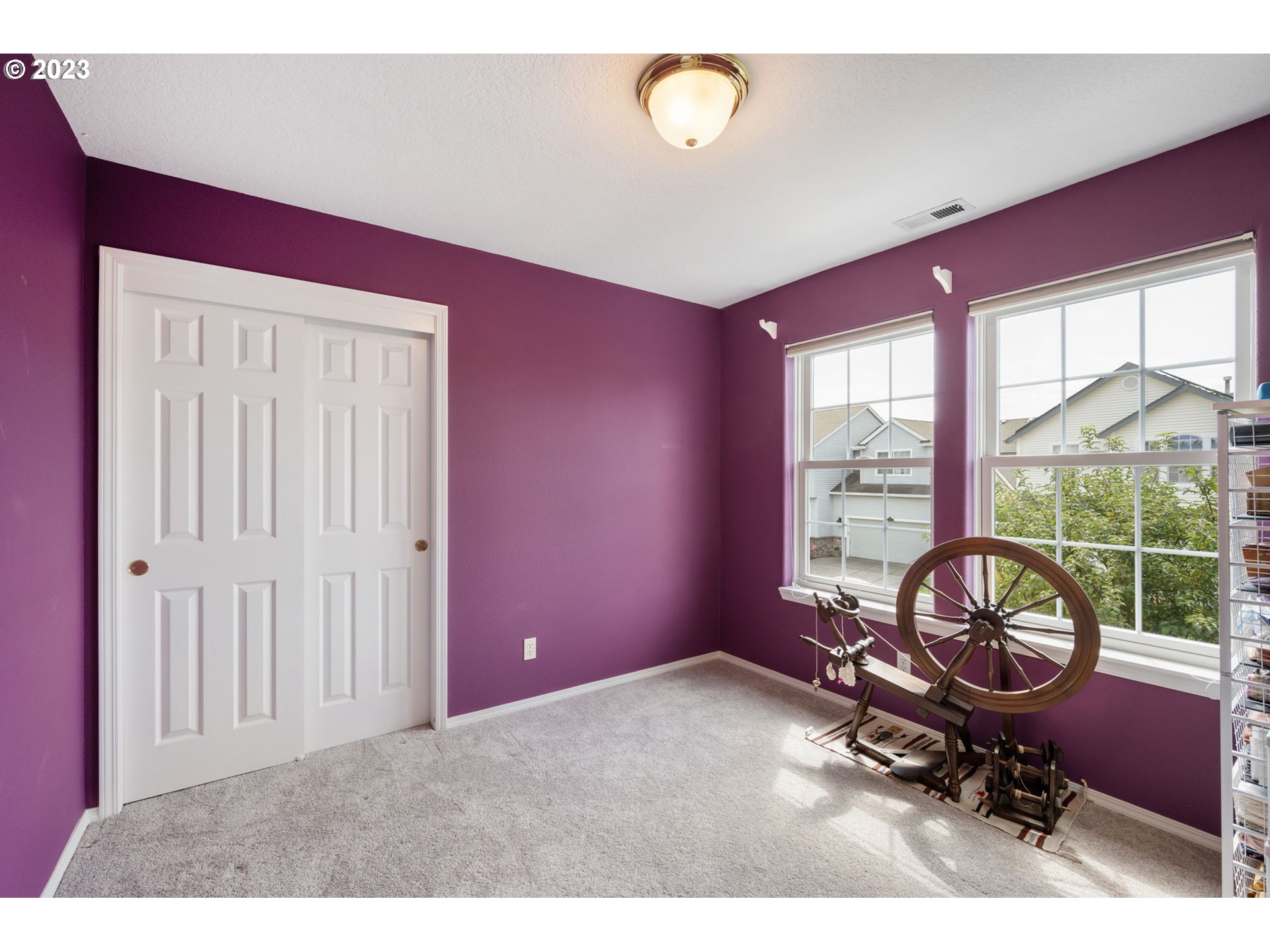 8627 Southwest Lodi Lane Portland, OR 97224 - Photo 27 of 41 a room with gym equipment and a large window