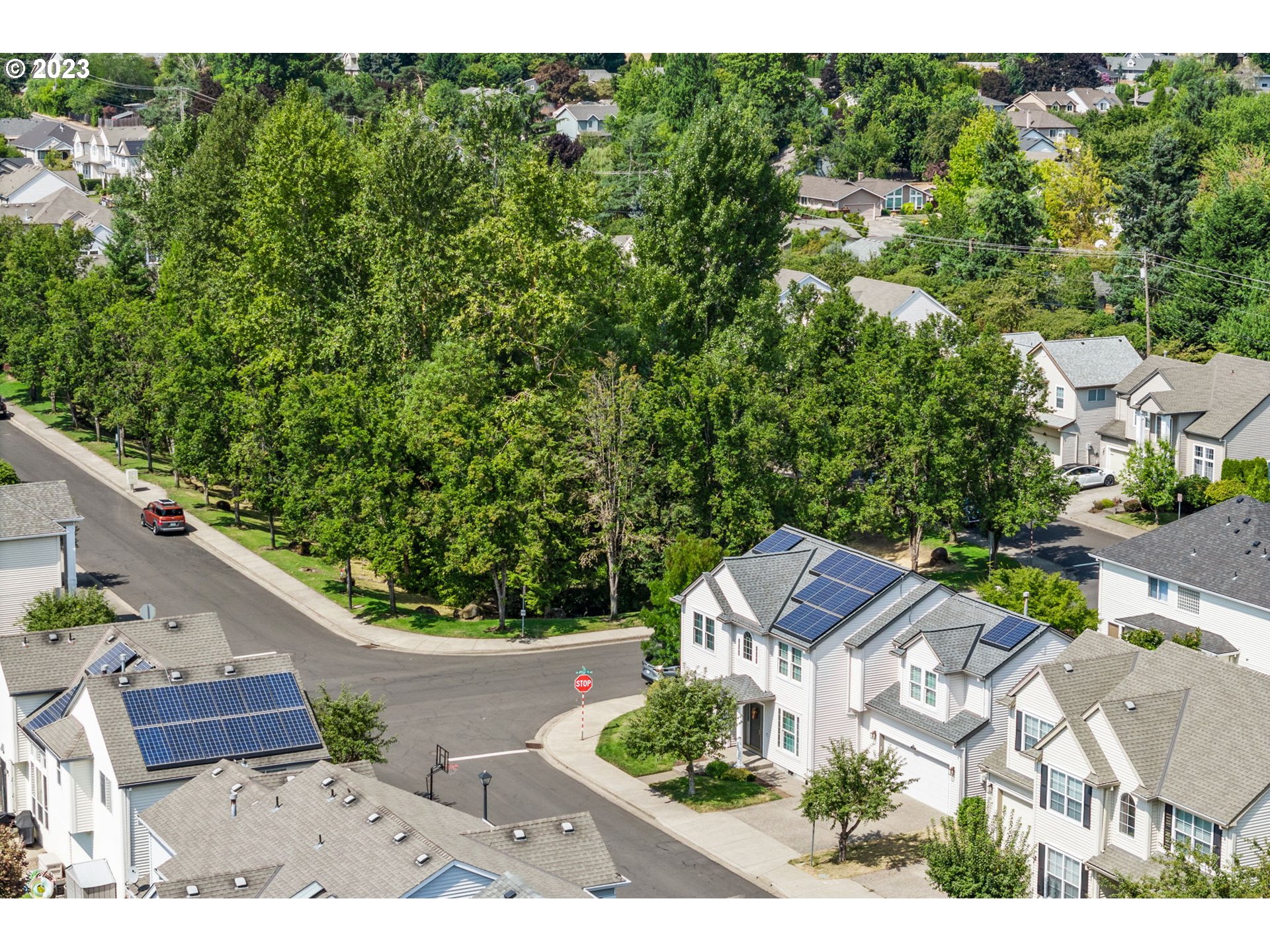 8627 Southwest Lodi Lane Portland, OR 97224 - Photo 32 of 41 an aerial view of a house with garden space and street view
