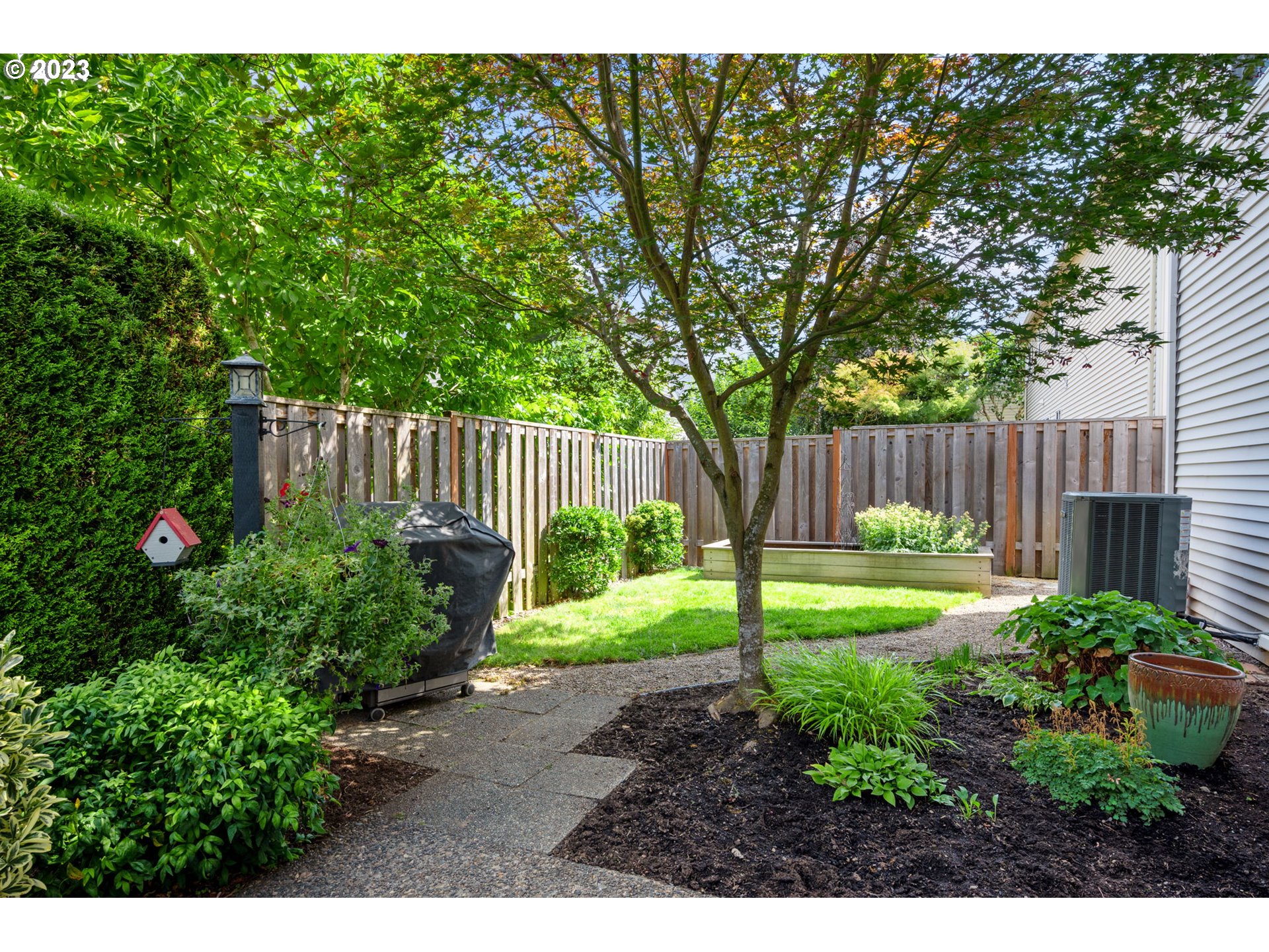 8627 Southwest Lodi Lane Portland, OR 97224 - Photo 37 of 41 a view of backyard with wooden fence